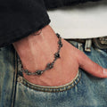 VEIL SPIKED BLACK DIAMOND CROSS BRACELET