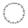 SPIKED CROSS BRACELET