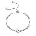 EVIL EYE CROSSES TENNIS BRACELET